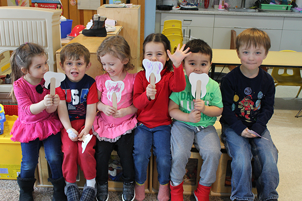 children learning about dental care